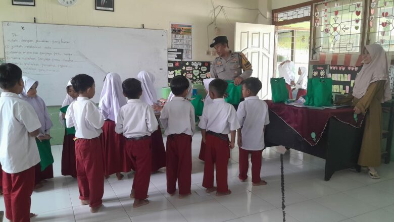 Polisi Amankan Penyaluran Makan Bergizi Gratis di SDN 1 Dasan Tapen